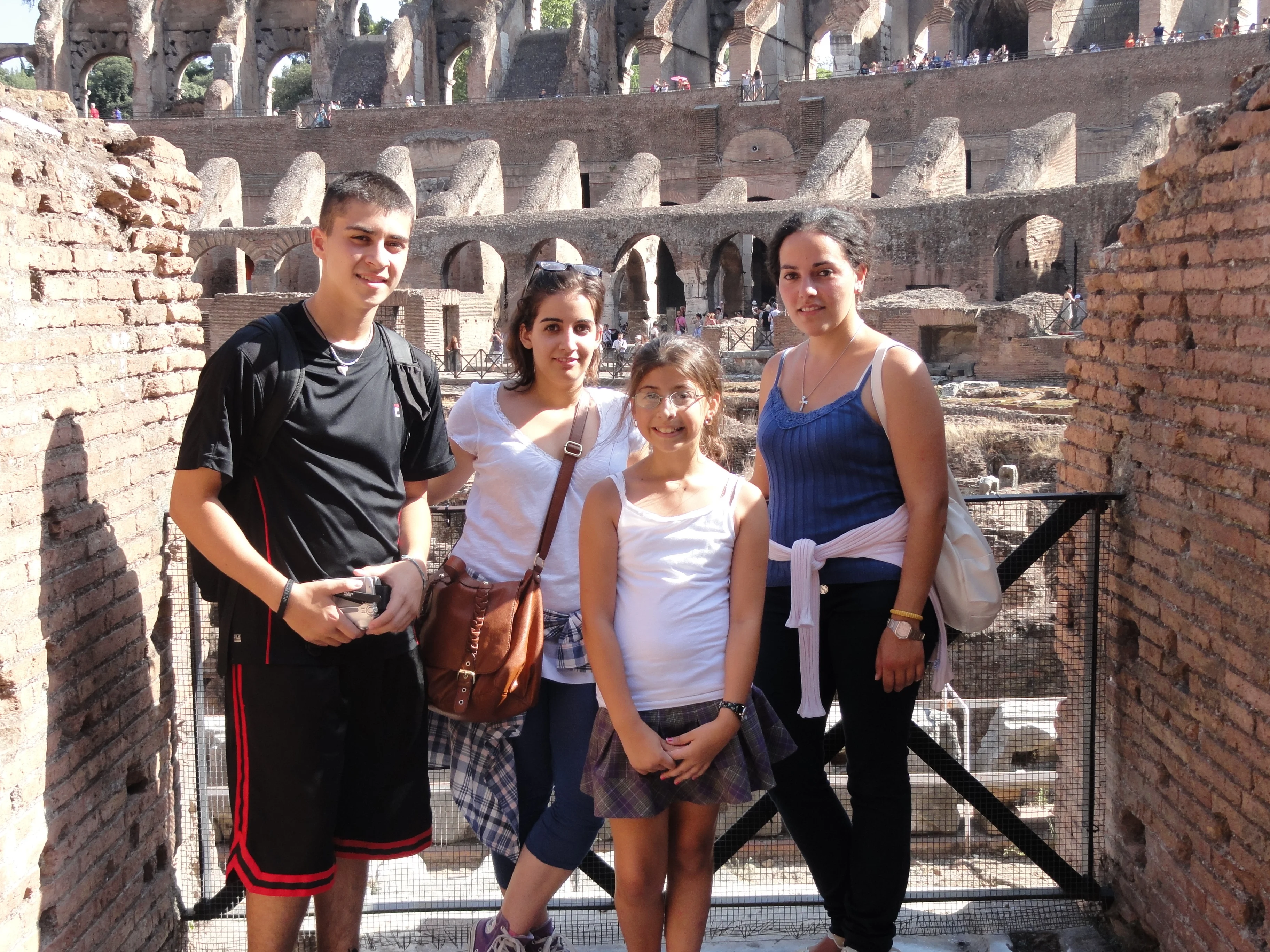 Mark, his sister Sara, and two Italian relatives inside the Colosseum in Rome.